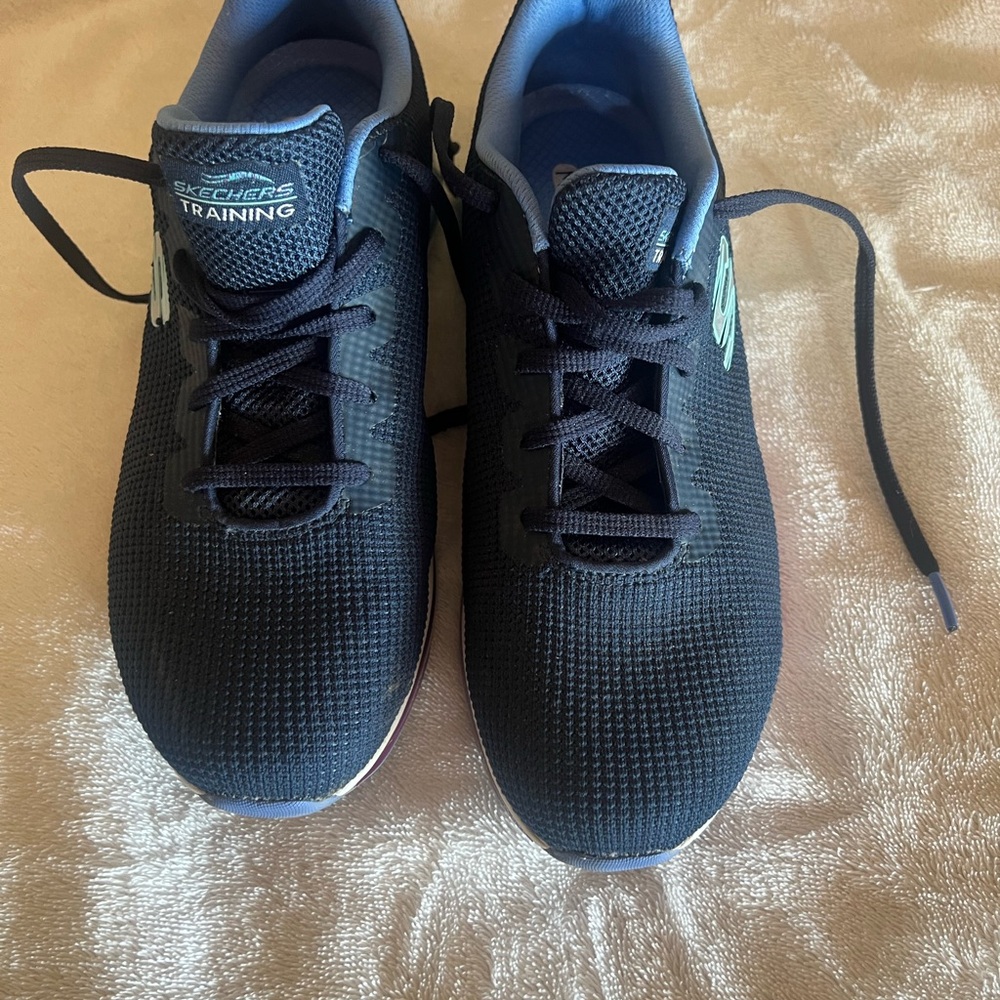 Women’s Skechers Black and Blue Memory Foam Sneakers. Warn twice.
